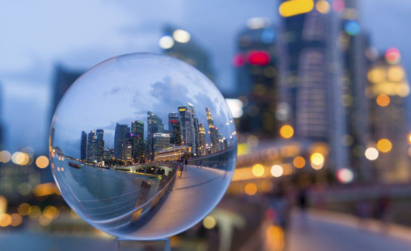Crystal Ball with Reflection of Singapore CBD Skyline