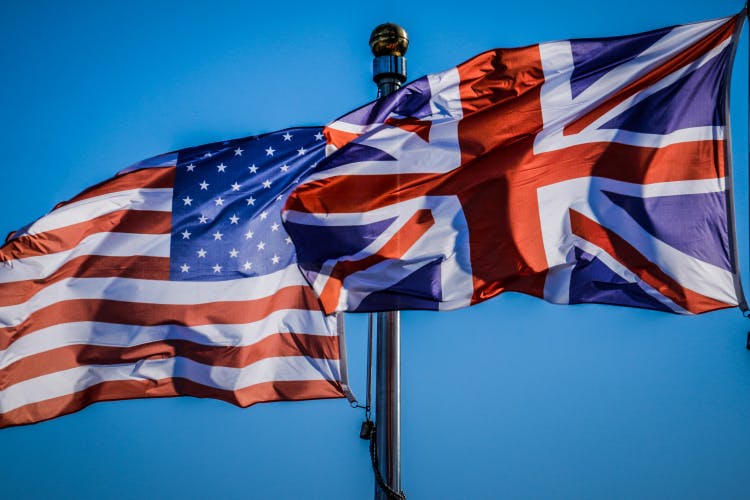US and UK flags: Laterals help US firms in London grow