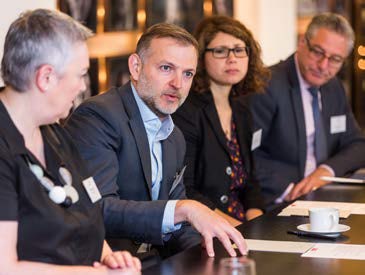 roundtable delegates discuss in-house lawyers manage transformation